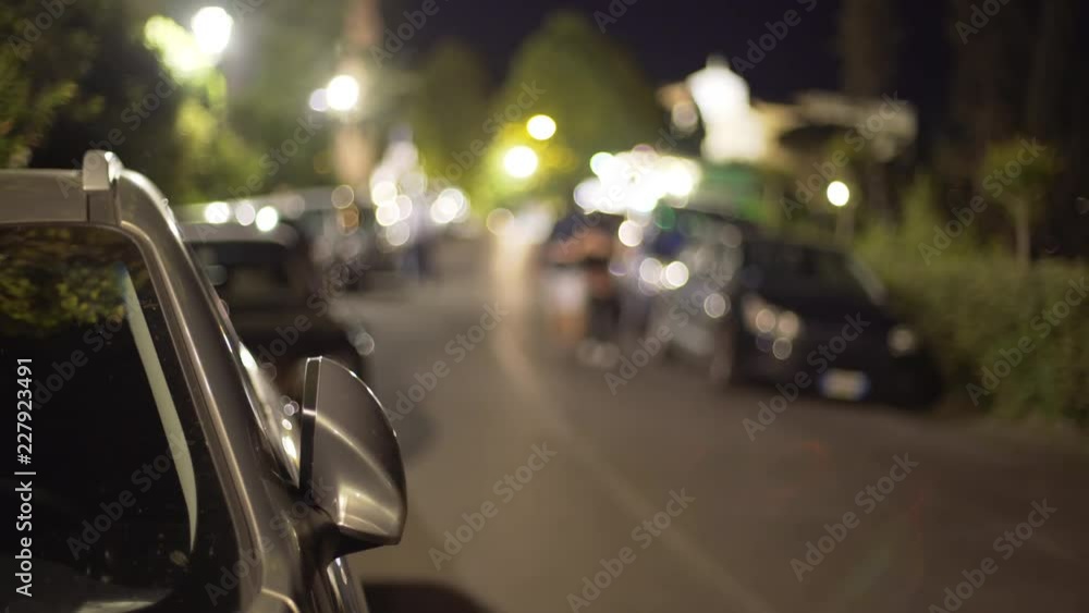 Blurred street scene with out of focus lights and cars Blurred street scene with out of focus lights and cars