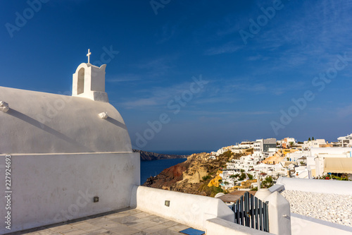 Santorini, Greece. Picturesque view of traditional Cycladic Oia Santorini's church on cliff