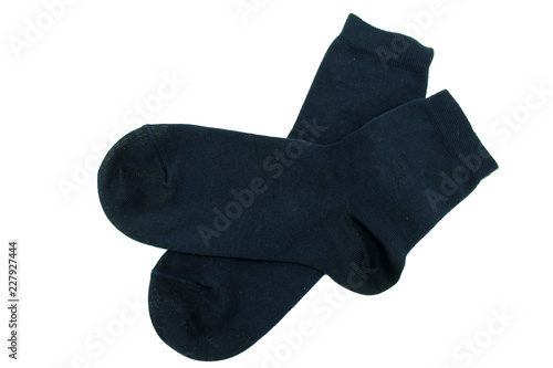 Knitted dark socks isolated on white background