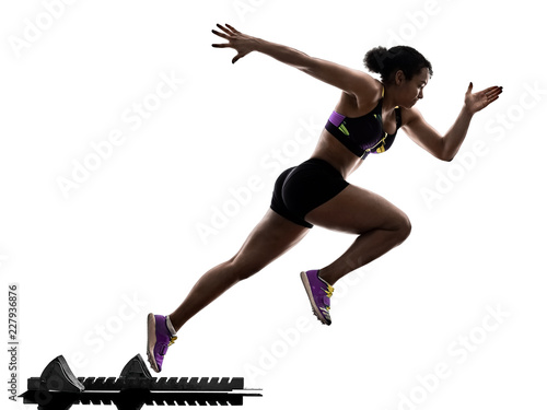 one african runner running sprinter sprinting woman isolated on white background silhouette photo
