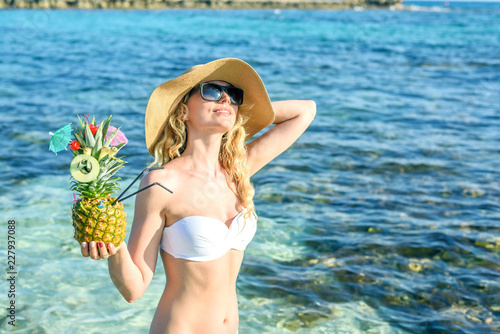 Happy girl drinking fresh juicy cocktail. Ayia Napa, Cyprus