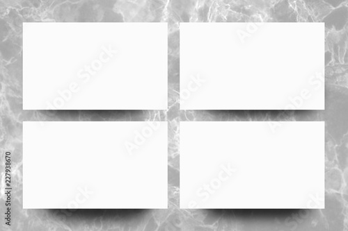 Empty white paper sheet on Grey marble background,Mock up for design.