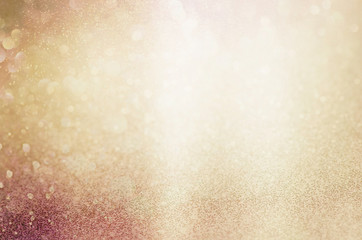 golden yellow glittering Christmas lights. Blurred abstract background