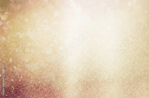 golden yellow glittering Christmas lights. Blurred abstract background