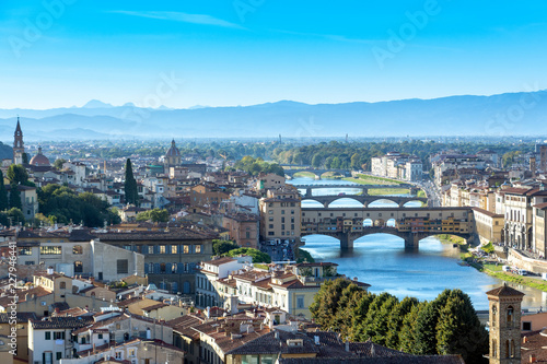 Panoramic view of Florence's skyline before the sunset with the view of the famous Vecchio bridge and the Arno river. © Suradech