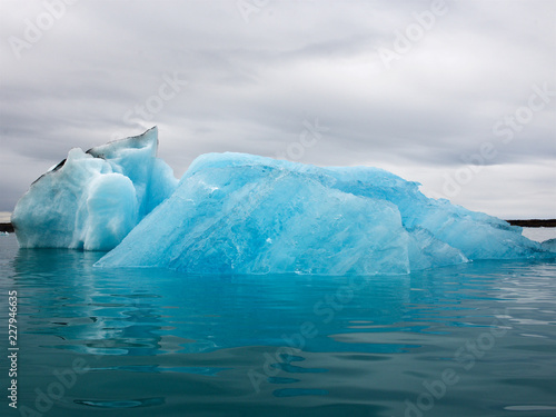 Iceberg floating in lagoon