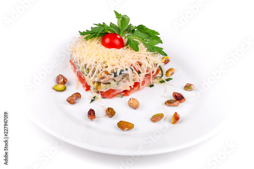 Salad of meat, cheese, cucumbers and tomatoes