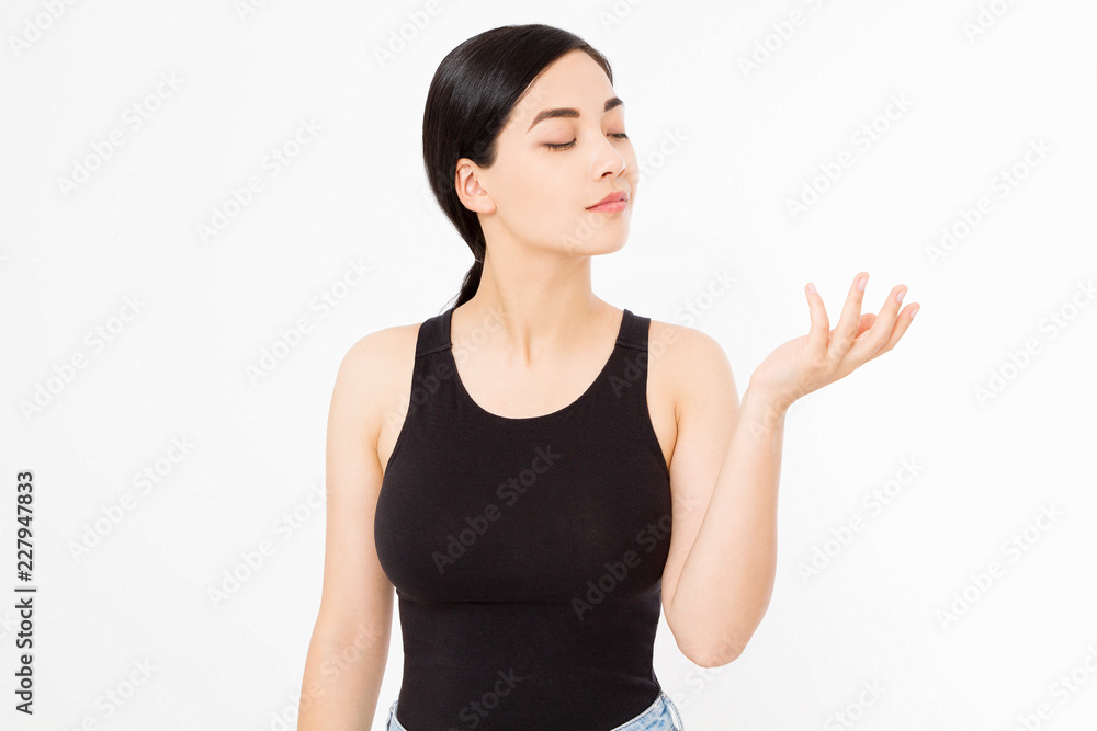 Skin care and spa concept. Asian young woman with makeup showing copy space isolated on white background. Template blank t shirt. Skin care and spa concept. Asian young woman with makeup showing copy space isolated on white background. Template blank t shirt.