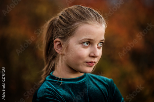Portrait of a young beautiful girl in autumn season surrounding - Image