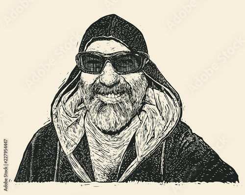 Cheerful  adult man with moustaches, beard and sun glasses in hood. retro engraving style. vector illustration.