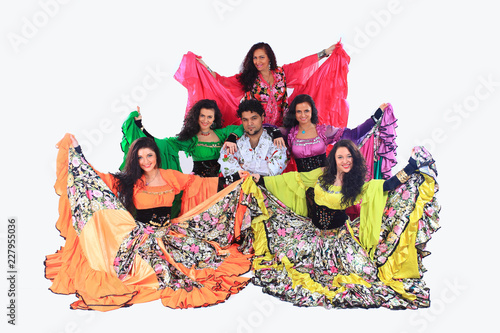 professional Gypsy dancing group in national costumes performing folk dance.