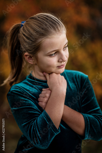 Portrait of a young beautiful girl in autumn season surrounding - Image