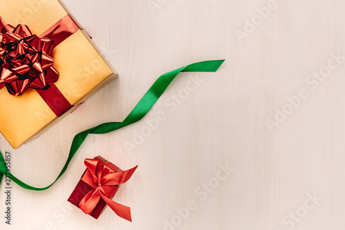Photography Gift boxes with ribbon on wooden background