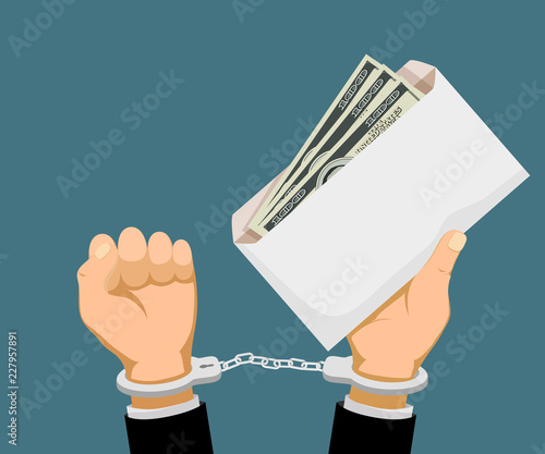 Man in handcuffs holds an envelope with dollar banknotes. Bribery and corruption.