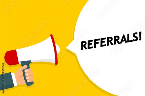 Hand holding Megaphone. Announcement. REFERALS! - stock vector.