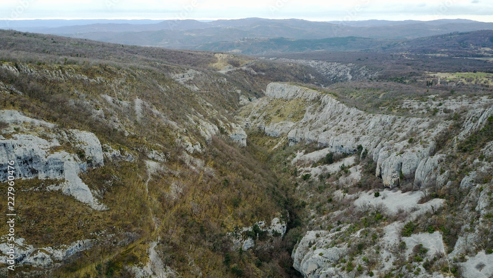 Vela draga (Vranjska draga) is a canyon in eastern Istria, Croatia. It is a unique natural geoheritage site due to its geological formations in shapes of various natural pillars. Vela draga (Vranjska draga) is a canyon in eastern Istria, Croatia. It is a unique natural geoheritage site due to its geological formations in shapes of various natural pillars.