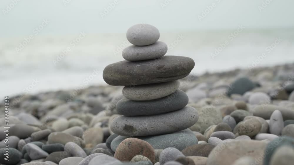 stack of zen stones near sea stack of zen stones near sea