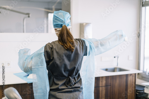 Фотография Portrait of a surgeon woman in sterile blue suit