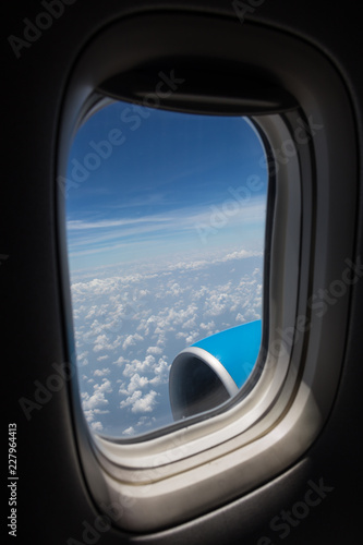 Airplane seat and window inside an aircraft