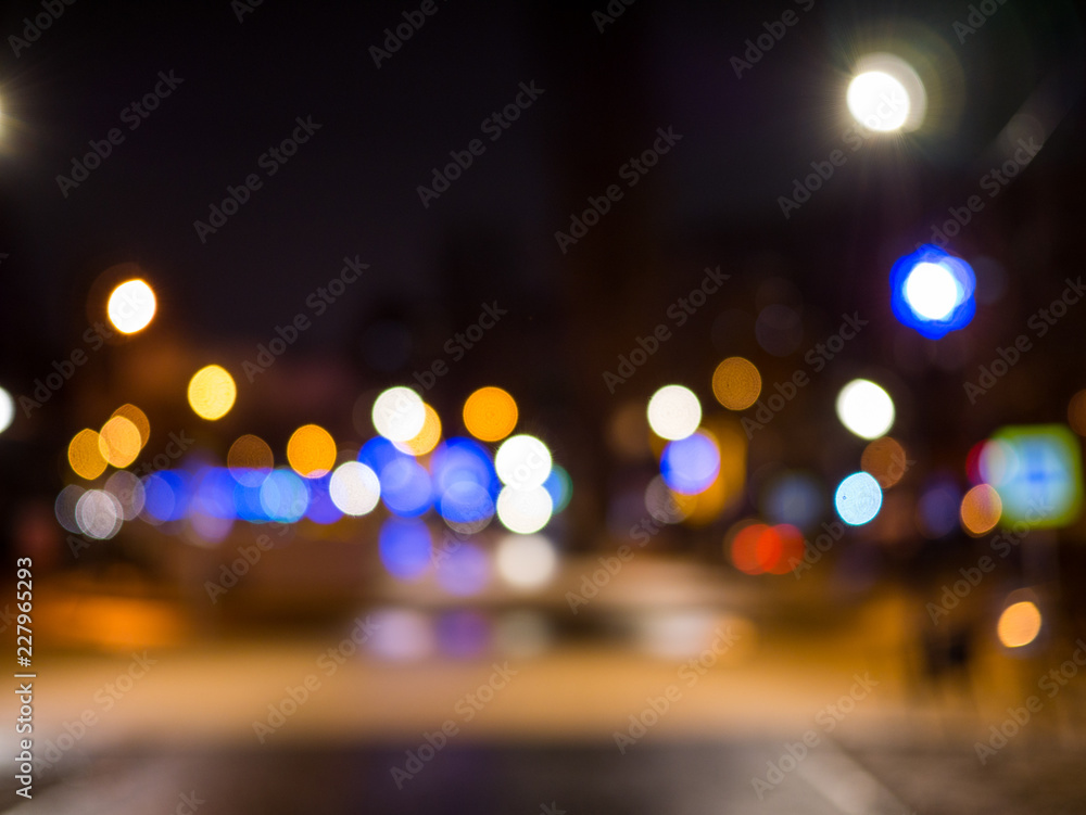 Night bokeh light in big city, abstract blur defocused background.