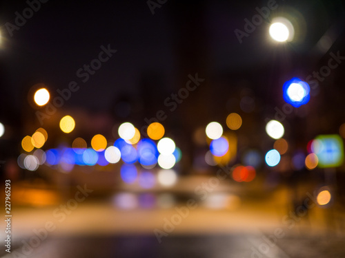 Night bokeh light in big city, abstract blur defocused background.