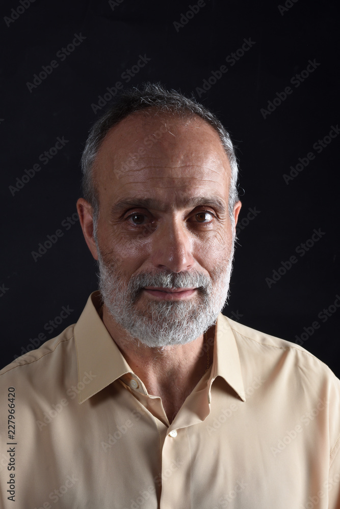 portrait of a middle aged man on black portrait of a middle aged man on black