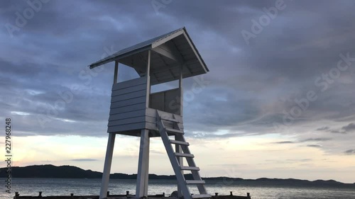 lifeguard tower on the beach. Wooden white pavilion at shore. Wood white pavilion at shore.