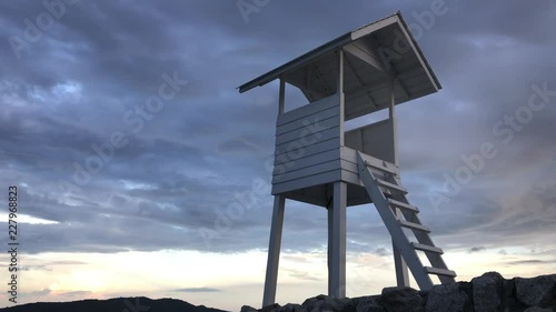 Wooden white pavilion at shore. Wood white pavilion at shore.