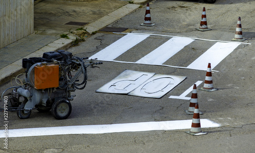 Spraying machine for execution of road signs, crosswalks etc. photo