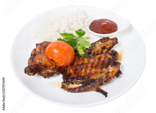 Grilled chicken tabaka with rice.
