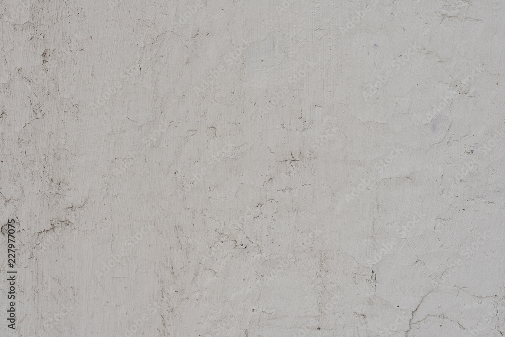 Wall fragment with scratches and cracks. It can be used as a background