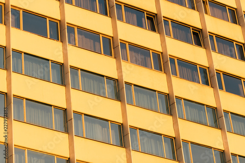 many windows of a high-rise residential building