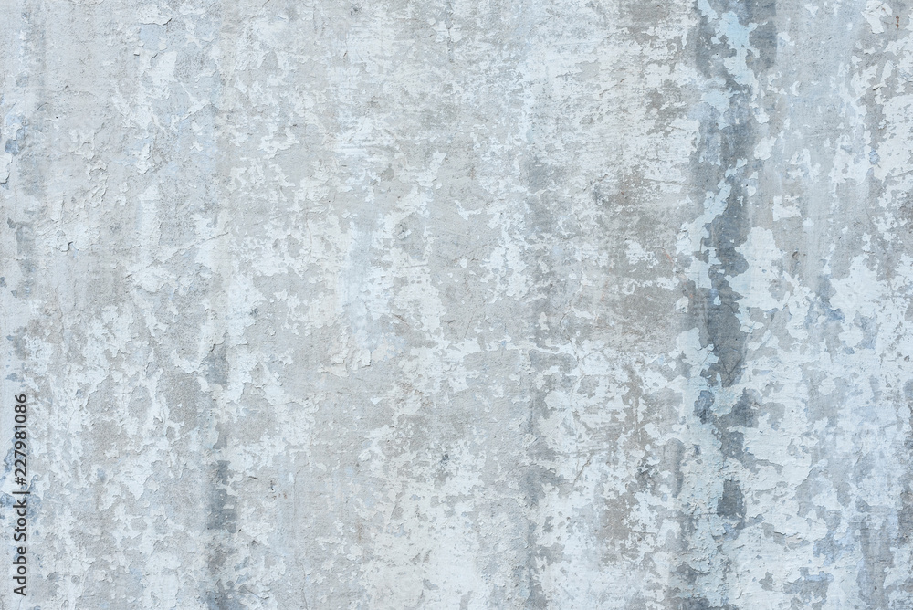 Wall fragment with scratches and cracks. It can be used as a background Wall fragment with scratches and cracks. It can be used as a background