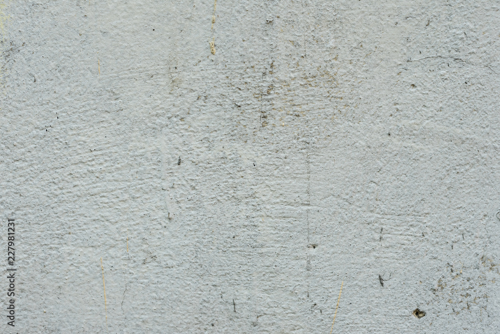 Wall fragment with scratches and cracks. It can be used as a background Wall fragment with scratches and cracks. It can be used as a background