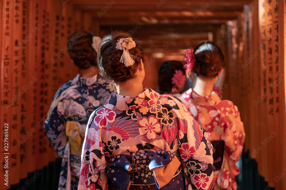 Girls walkin Fushimi Inari Shrine on Geisha attire