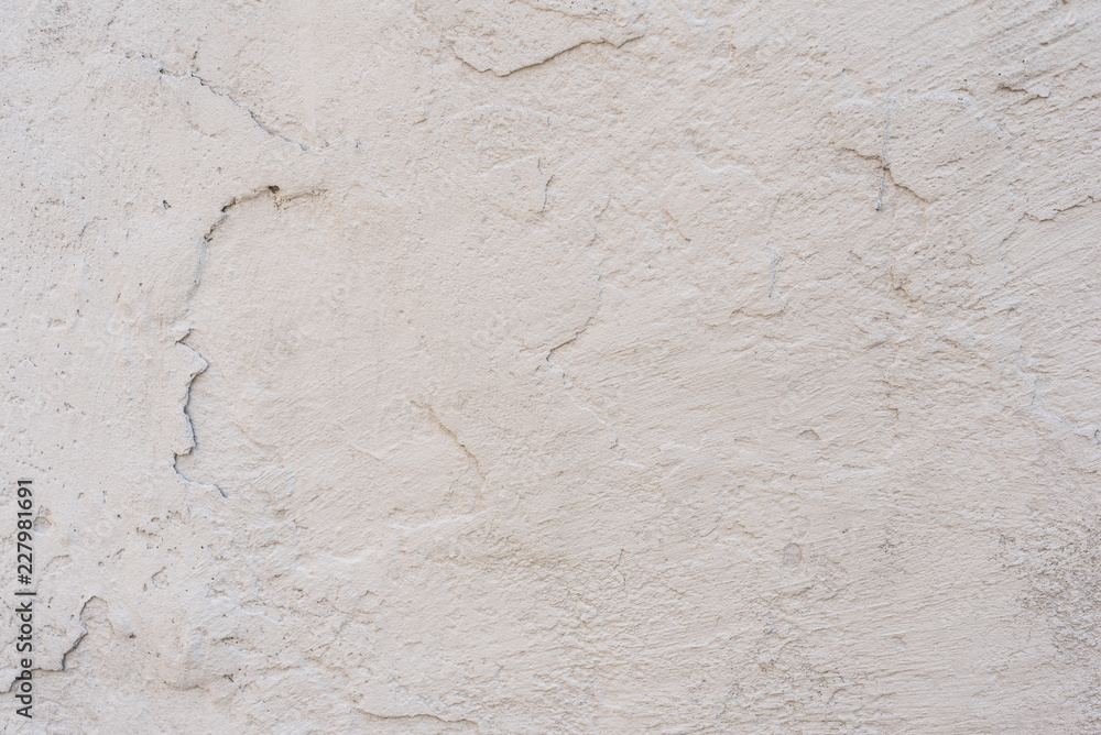 Obraz premium Wall fragment with scratches and cracks. It can be used as a background