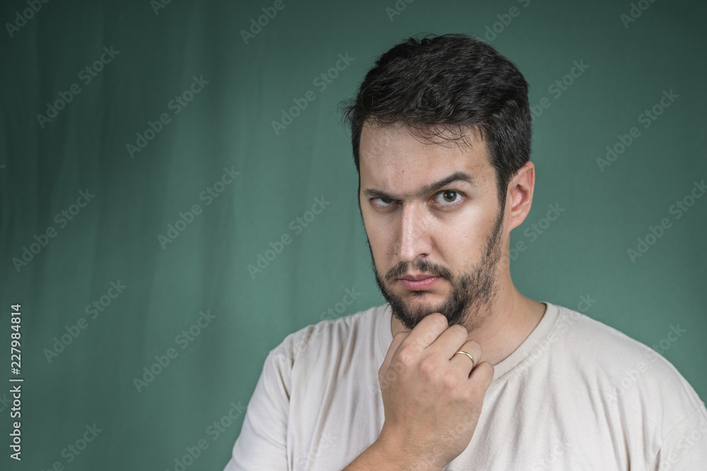 man with a beard and interesting look man with a beard and interesting look