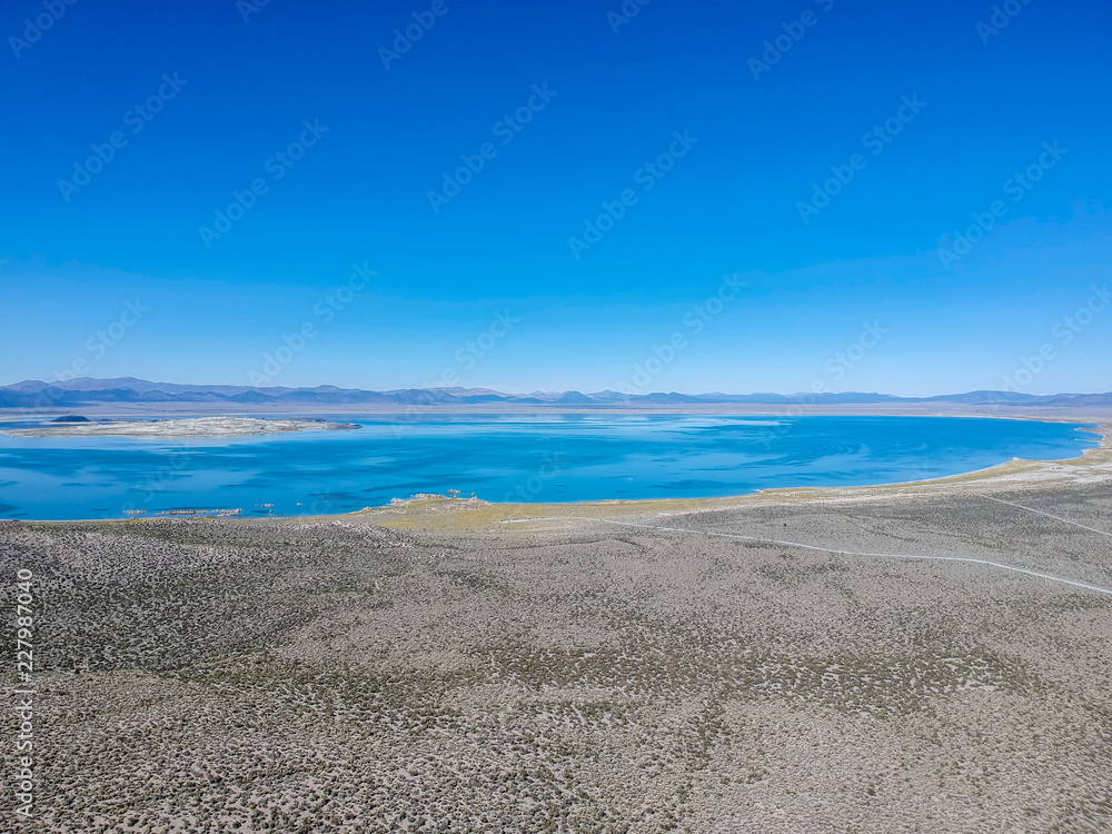 drone view of a lake in the desert.