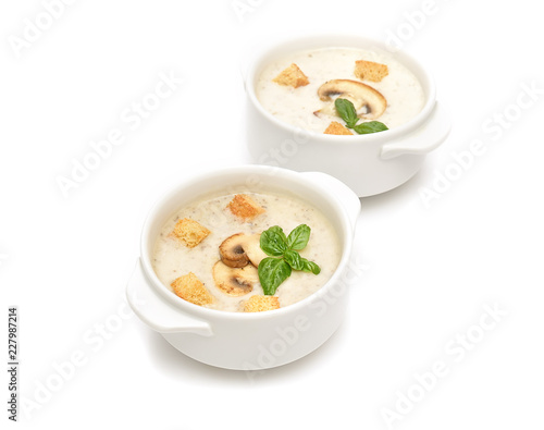 champignon soup with croutons on white background