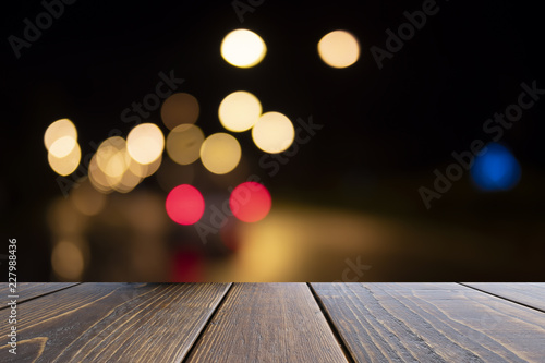 Wooden desk of brown on front blurred background  used for presentation product and templated