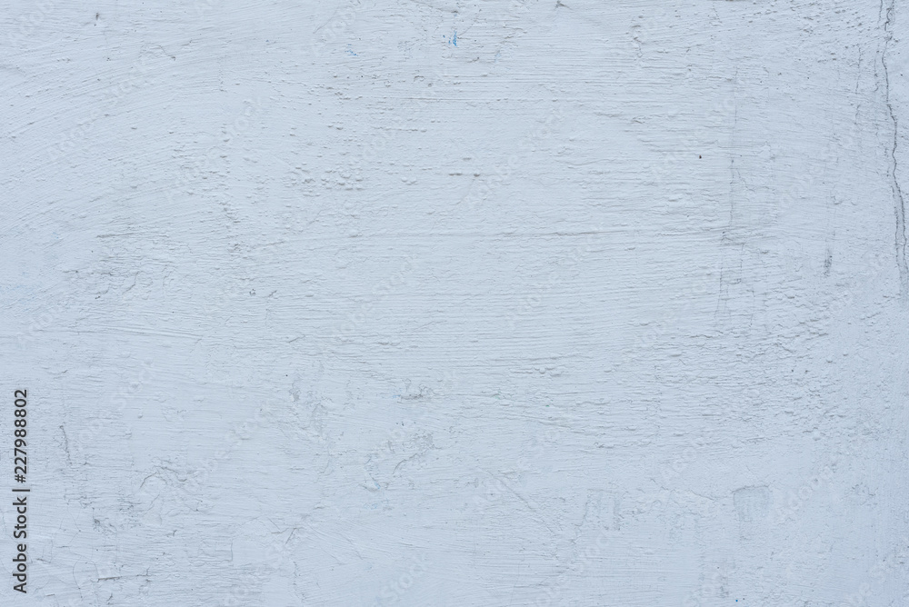 Fototapeta premium Wall fragment with scratches and cracks. It can be used as a background