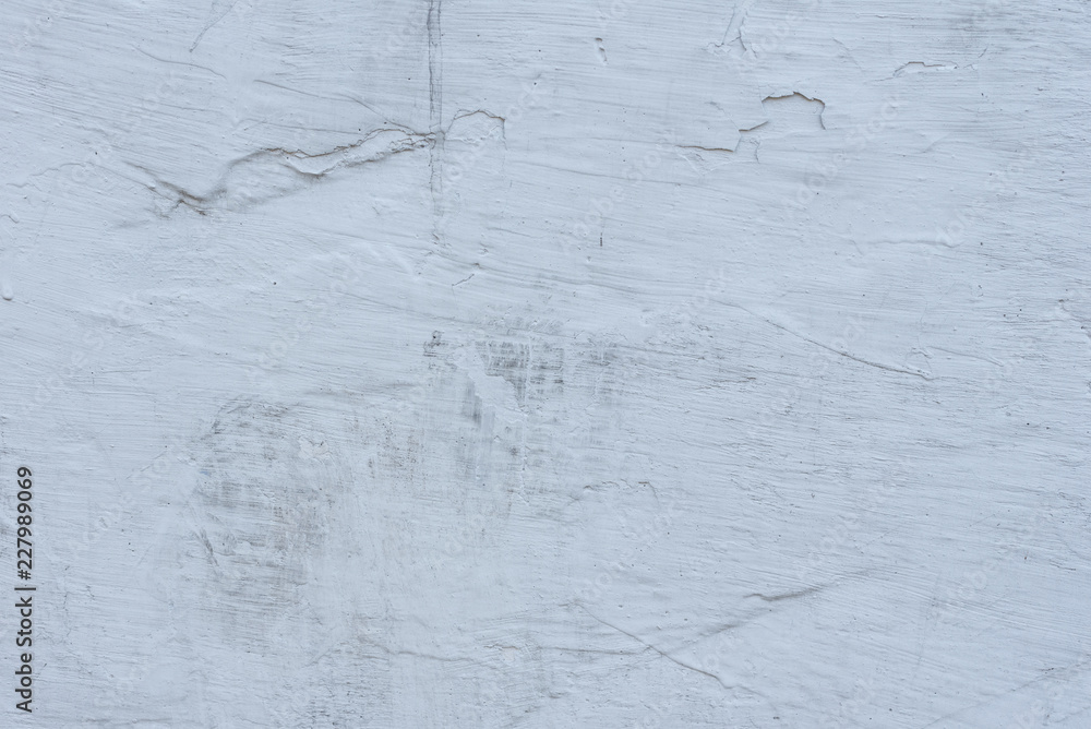 Wall fragment with scratches and cracks. It can be used as a background Wall fragment with scratches and cracks. It can be used as a background