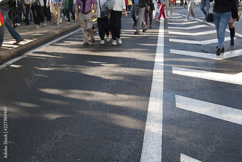 Group of people walking around the city