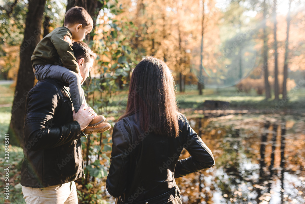 Fototapeta premium happy family in autumn park
