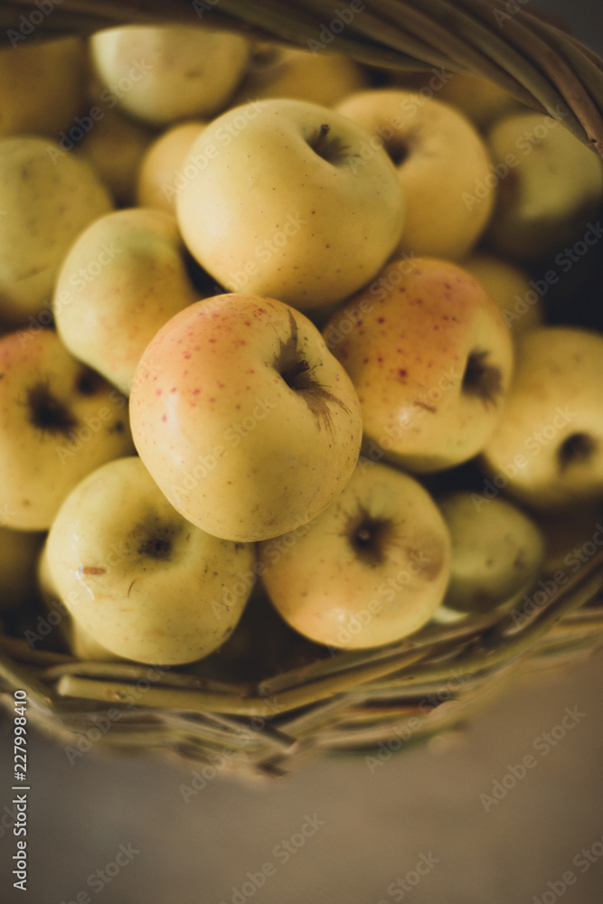 apples in wicker basket apples in wicker basket