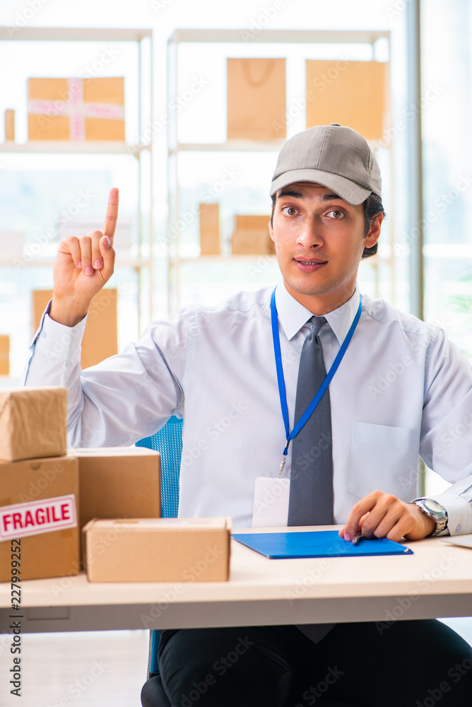Male employee working in box delivery relocation service Male employee working in box delivery relocation service