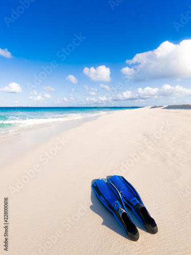 Snorkeling equipment on tropical white sandy beach - Summer Holidays