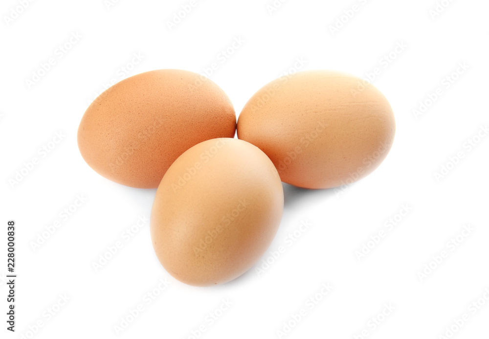 Raw brown chicken eggs on white background Raw brown chicken eggs on white background
