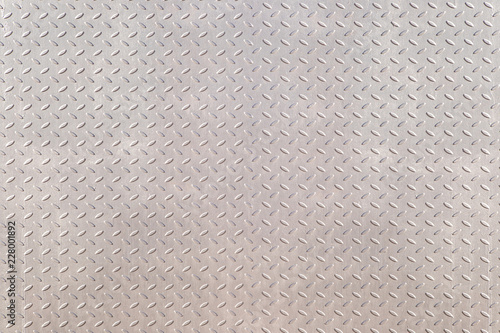 Used checkered painted steel plates background.