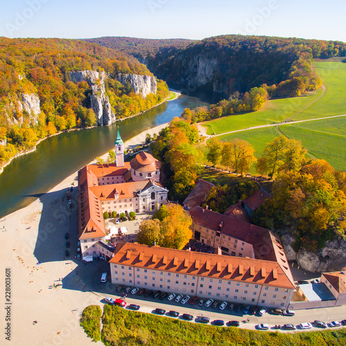 Aerial view to Weltenburg Abbey - Kloster Weltenburg. This landmark is a Benedictine monastery in Weltenburg in Kelheim on the Danube in Bavaria, Germany. photo